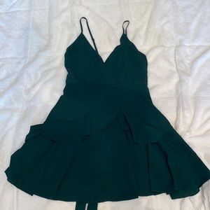 Dark green dress with ruffles